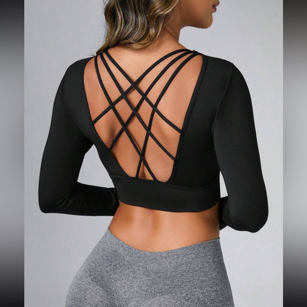 Strappy back top long sleeve crop athletic wear black open back padded